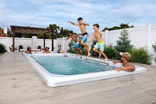 Family and friends enjoying a hot tub